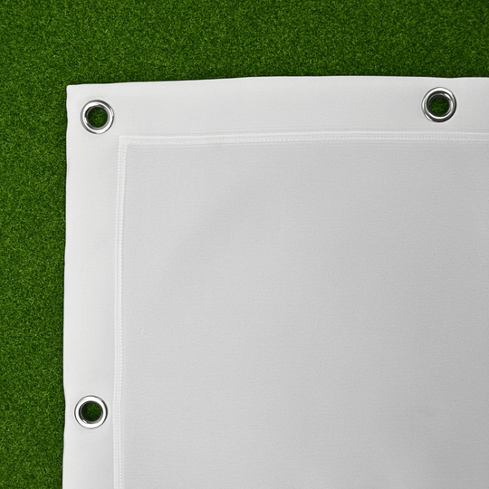 Corner of Golf Impact Screen on green golf turf