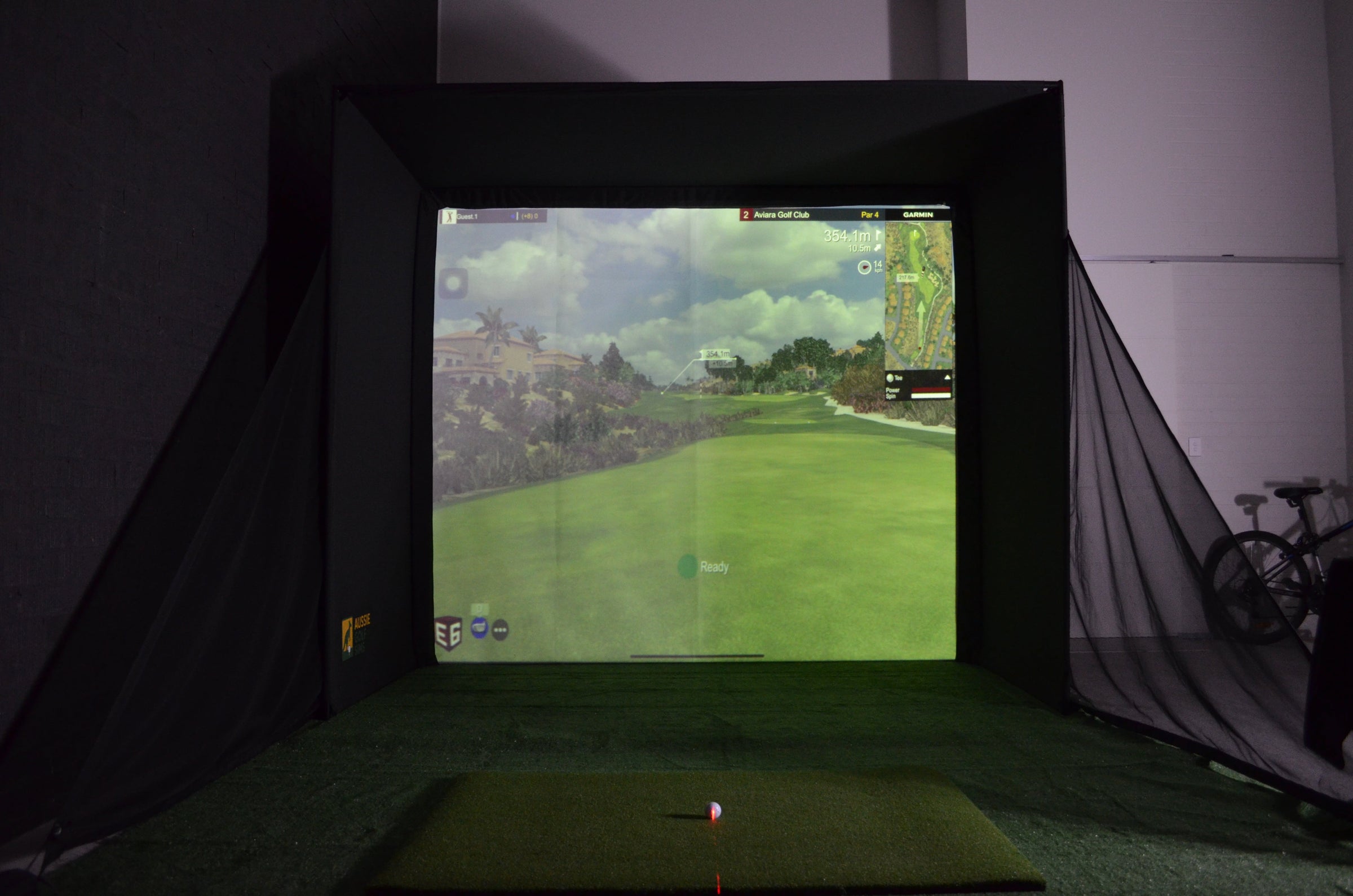 Golf Simulator Enclosure with hitting mat