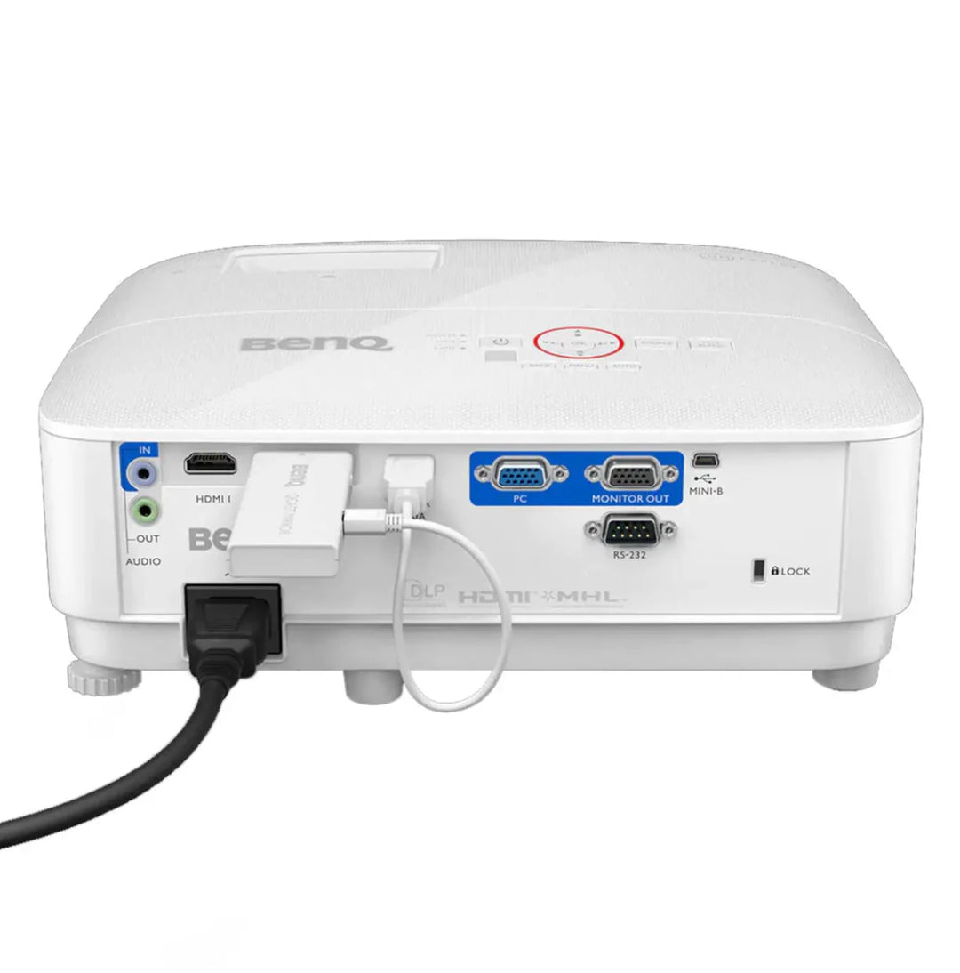 White BenQ TH671ST golf simulator projector, rear view showing multiple input/output ports and power cable.