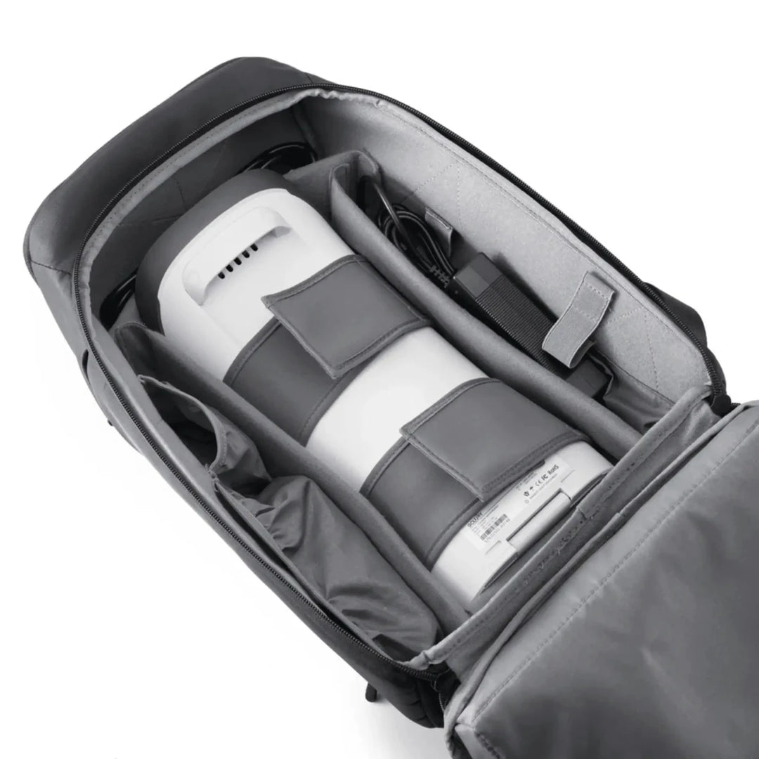 Golf Joy Spica 3 launch monitor, white with gray straps, packed in a black and gray padded carrying case.
