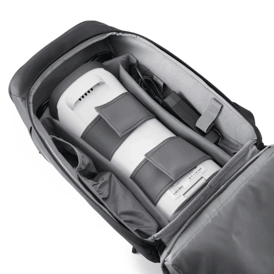 Golf Joy Spica 3 launch monitor, white with gray straps, packed in a black and gray padded carrying case.