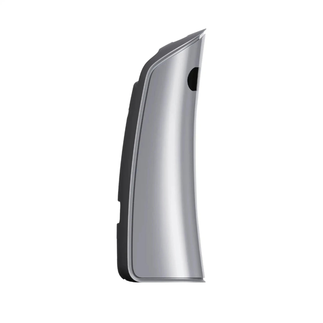 Sleek silver Golf Joy GDS Pro launch monitor, compact and curved, with a dark camera lens visible.