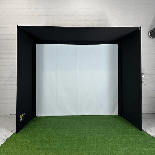 Golf practice simulator with green floor and white wall