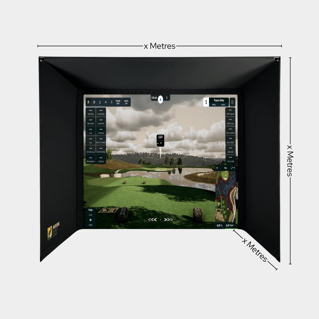 Black custom golf simulator enclosure kit with a projected golf course scene and data.