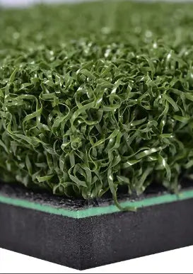 Close-up of Tee up hitting mat